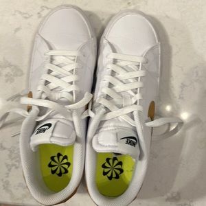 Nike women’s sneakers. Only worn twice- too big for my feet